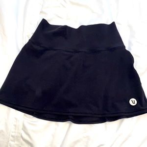Size small vuori black skirt. Super cute. Excellent shape!